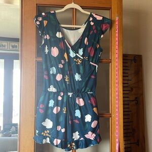 Pair of romper swimsuits.